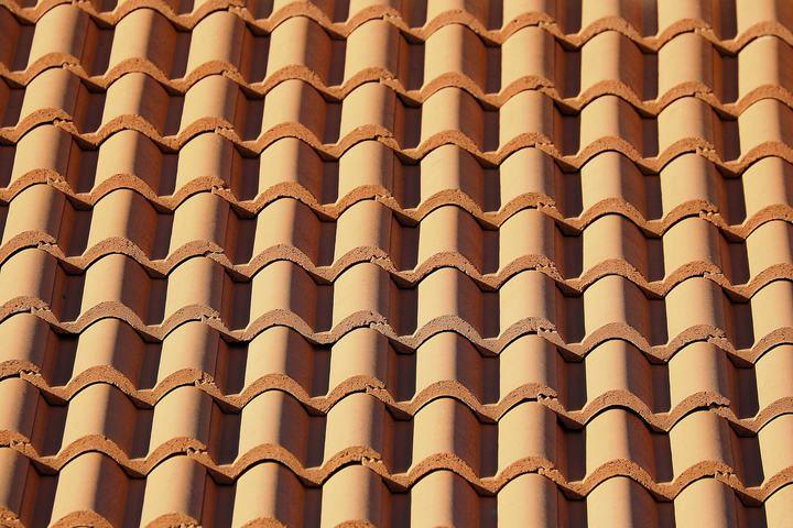 Clay barrel roof tiles, close up